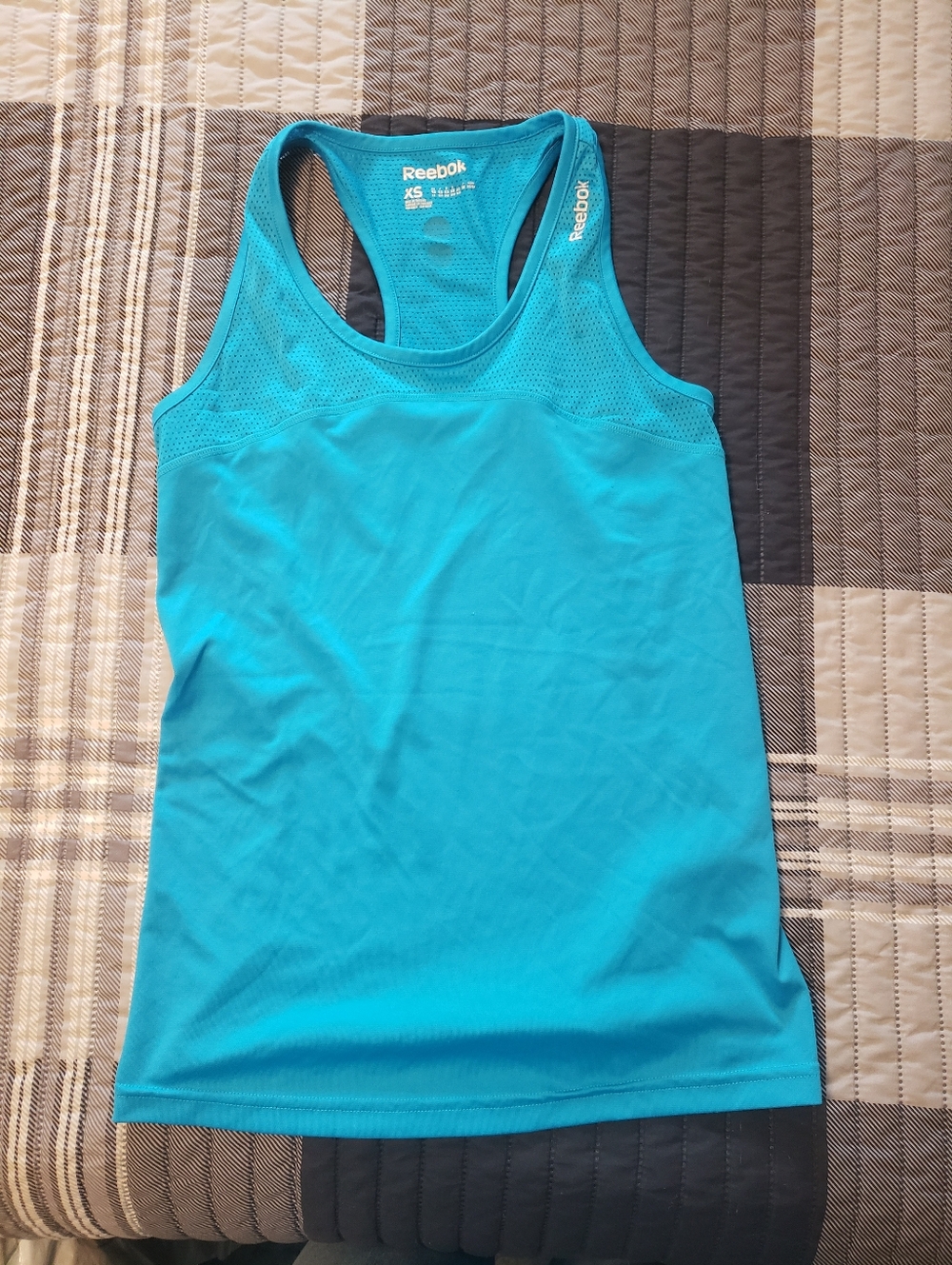 Reebok Women’s Bright Turquoise Racerback Performance Tank